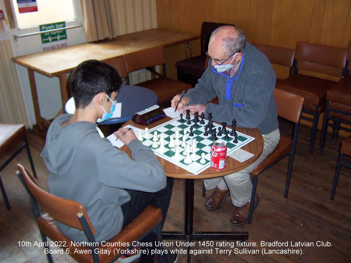 A few men playing chess

Description automatically generated with low confidence